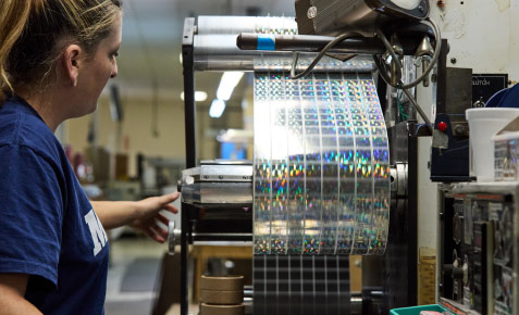 woman operating Milpak machine
